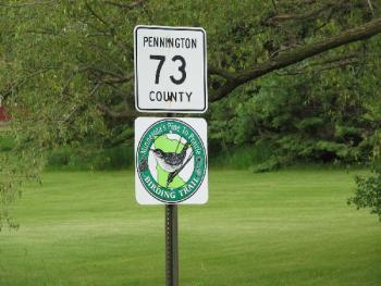 street sign for the Pine to Prairie Birding Trail 